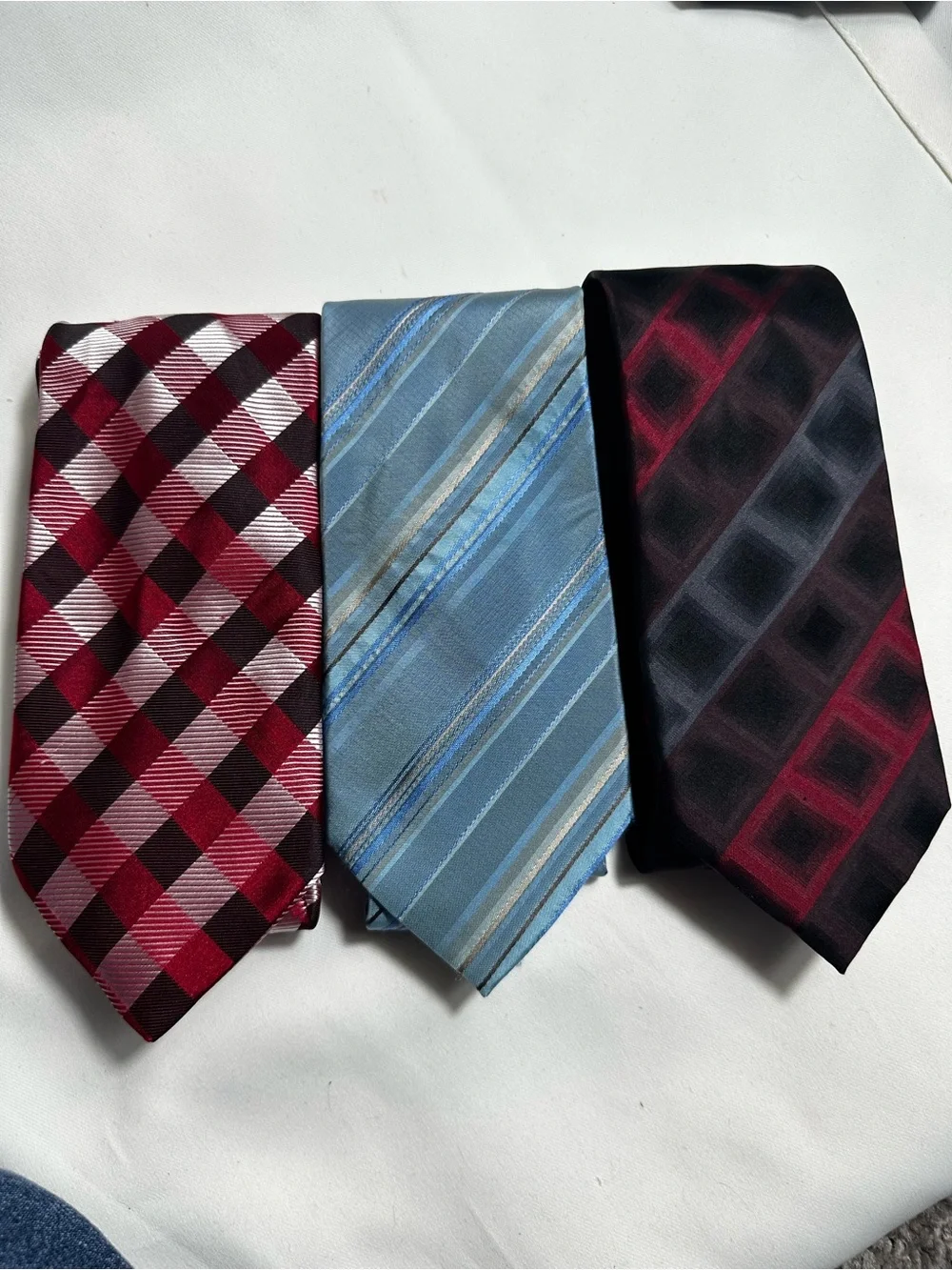 A56.  Van Heusen and Versa Three-Piece Tie Set - Red, Blue, Black